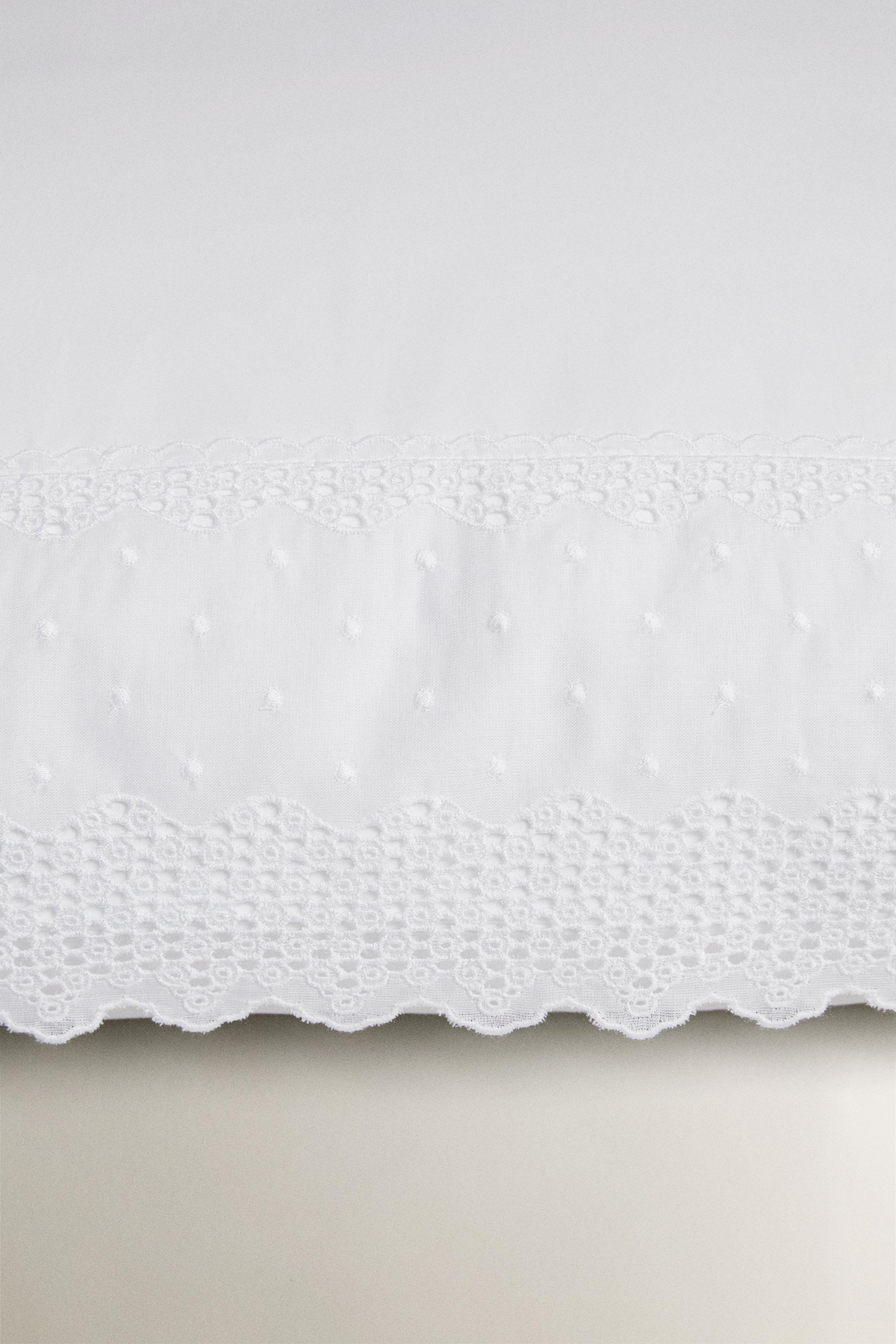 TAIE D’OREILLER BRODÉE